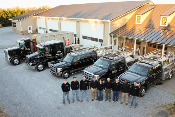 The Byler Builders team and trucks
